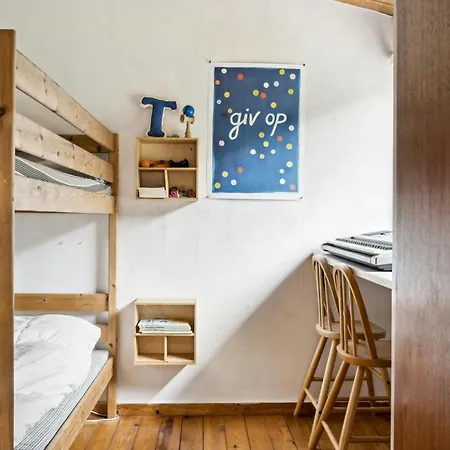 Experience The Simple Life In A Retro Wooden House Feriehus