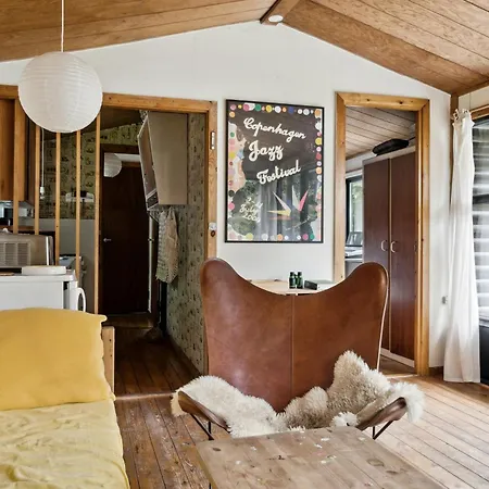 Experience The Simple Life In A Retro Wooden House *