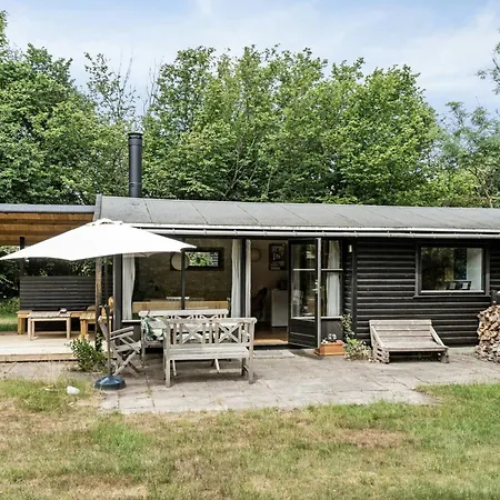Experience The Simple Life In A Retro Wooden House *